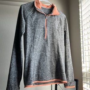 under armor heather grey long sleeve quarter zip with coral/orange detailing
